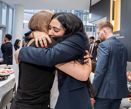 two students embracing