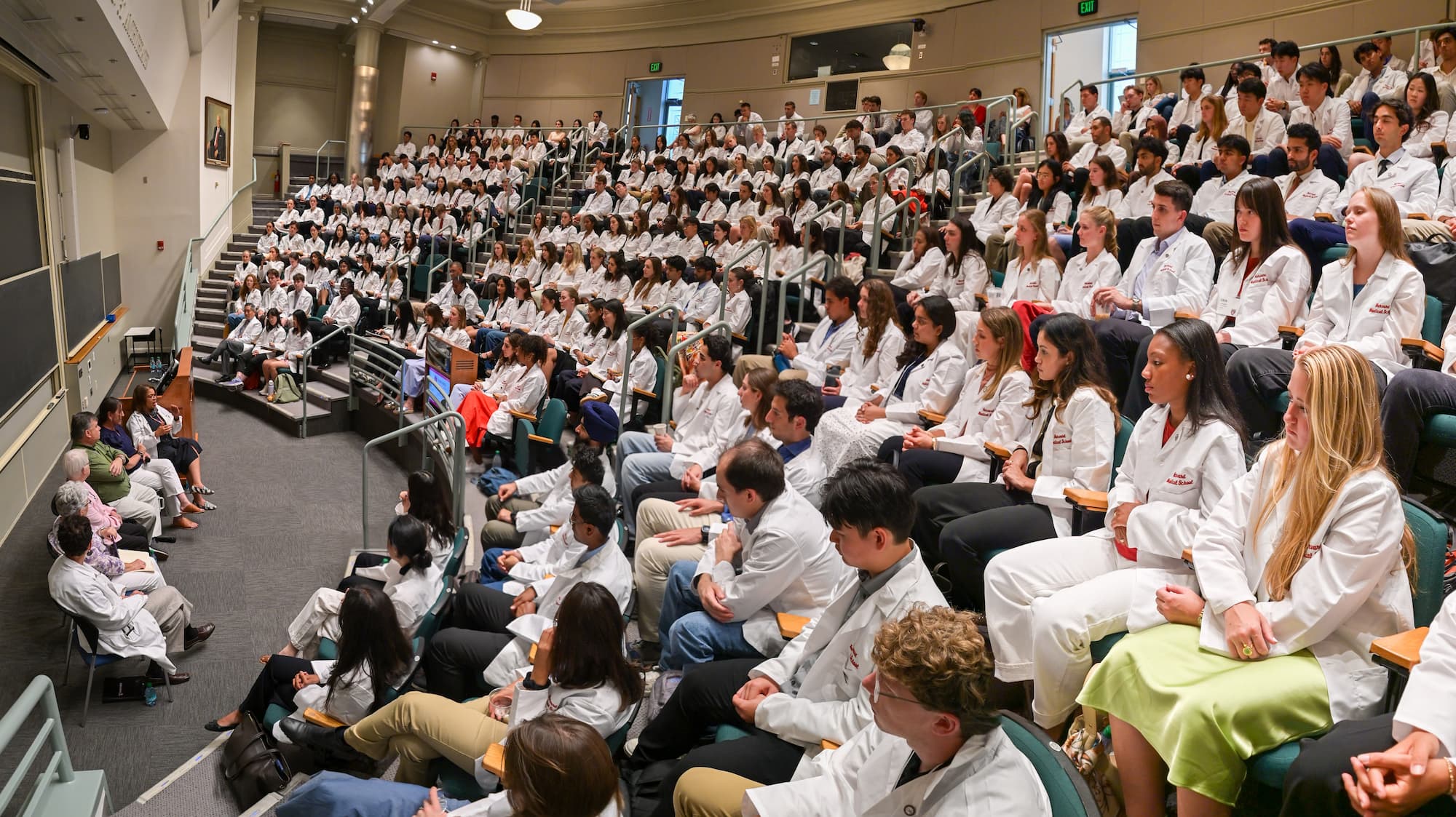 Students in filled amphitheater