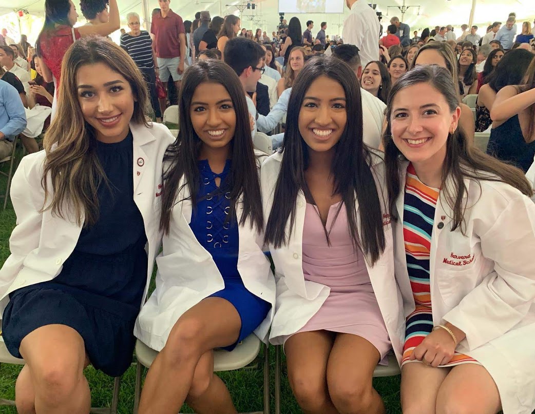 Alisha and Natasha Nanji alongside their HSDM classmates