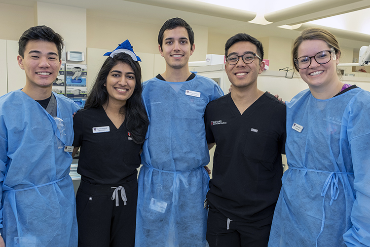 DMD students at Give Kids a Smile event