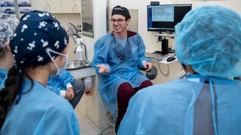 Students in PPE in an operatory.
