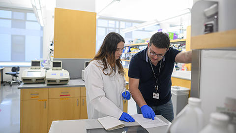 researchers in lab
