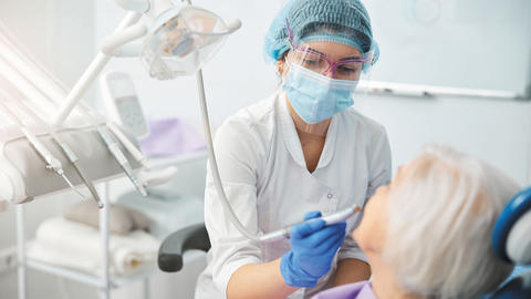 Dentist with a patient