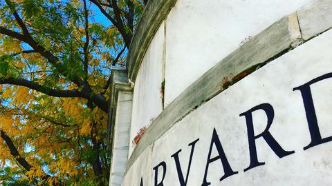 Harvard lettering etched in external marble wall