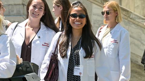 students in white coats