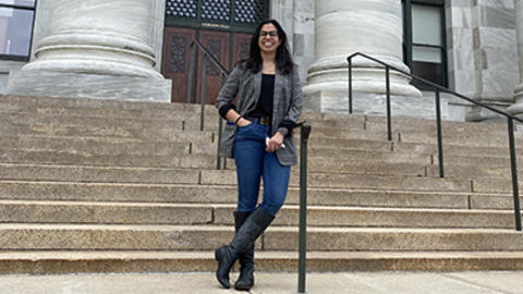 Ashiana Jivraj, DMD21, in front of Gordon Hall at Harvard Medical School