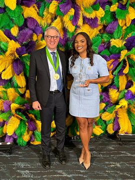 Dean Giannobile and Zerita Buchanan with awards