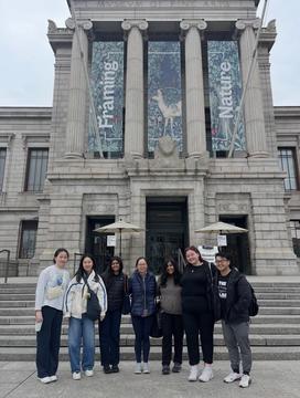 A group of Vanderbilt Hall residents pose outside the Museum of Fine Arts, Boston during a community outing.