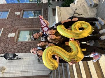 students on steps of HSDM main building