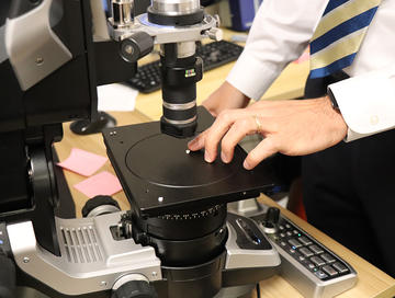 A bracket under a microscope