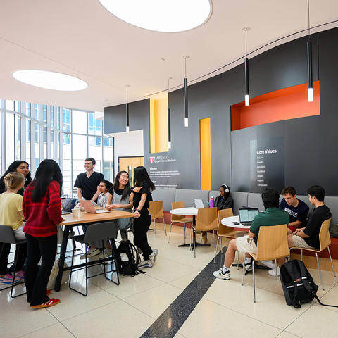 Students gathering in the REB lobby