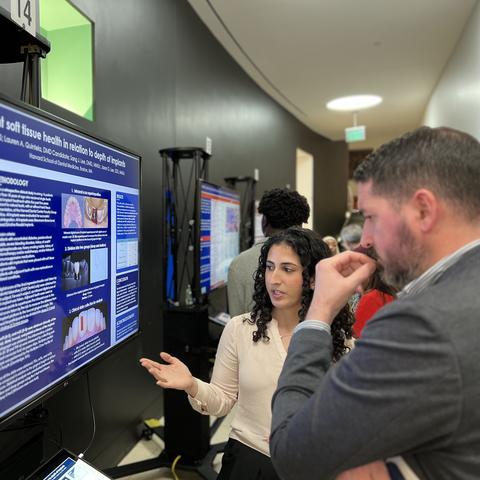 Student in front of screen taking with a judge