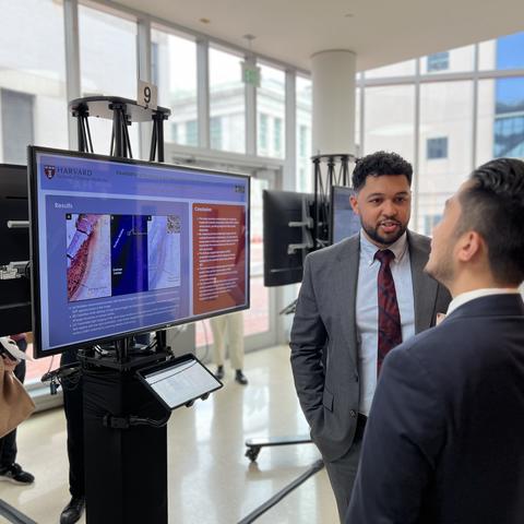 Student in front of screen taking with a judge