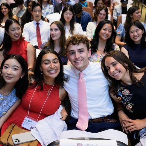 students sitting in the auditorium