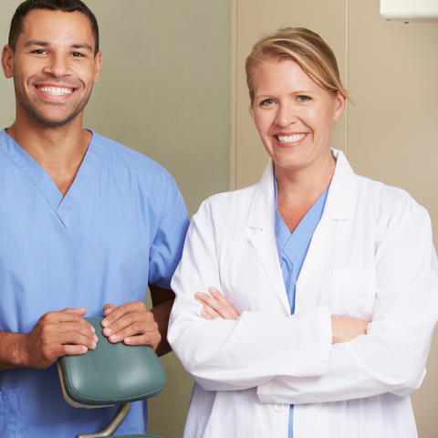 stock image of three dental professionals