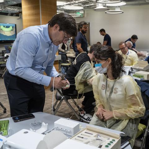instructor working with a student