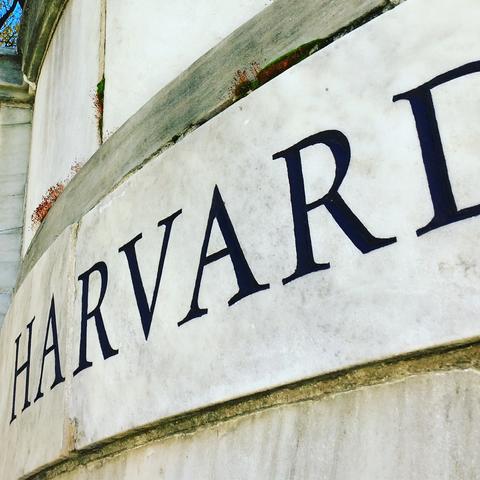 Harvard lettering etched in external marble wall