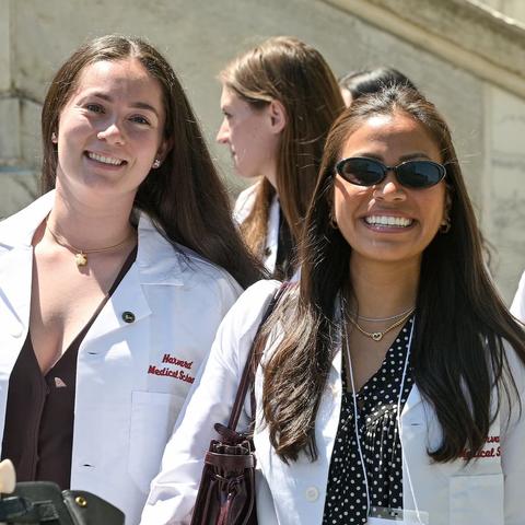 students in white coats