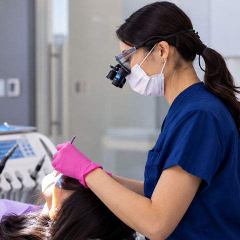 Female dentist working on a patient