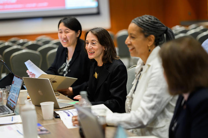participants in front of laptops