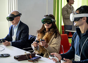 Participants with virtual reality headsets on.