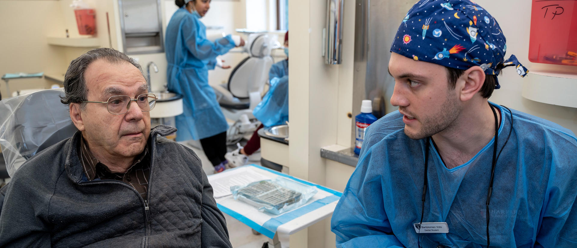 Bart talking with a patient at the GVAS clinic