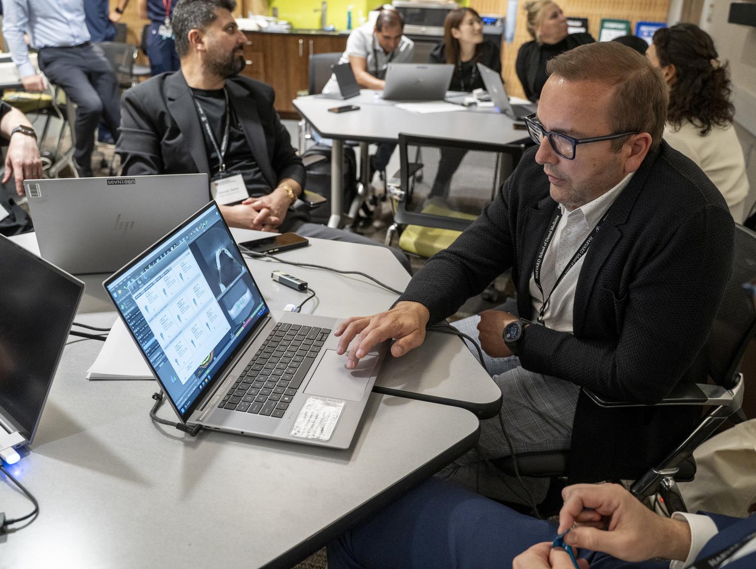Man looking at a laptop