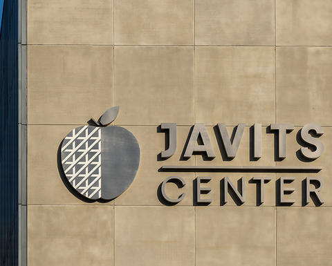 Close up of the Javits Center sign on the building in New York, NY