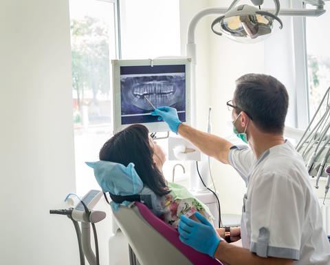 Dentist with a patient