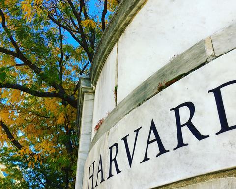 Harvard lettering etched in external marble wall