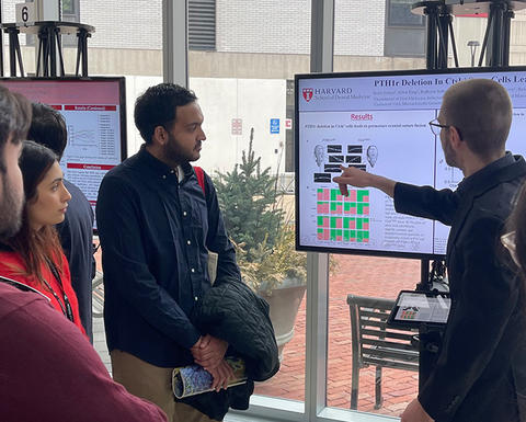 student presenting to attendees